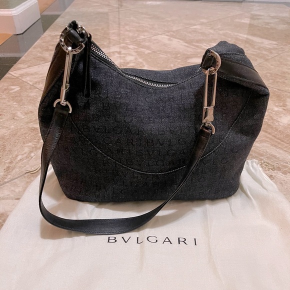 BVLGARI Handbags - Bvlgari purse and dust bag. used one time.